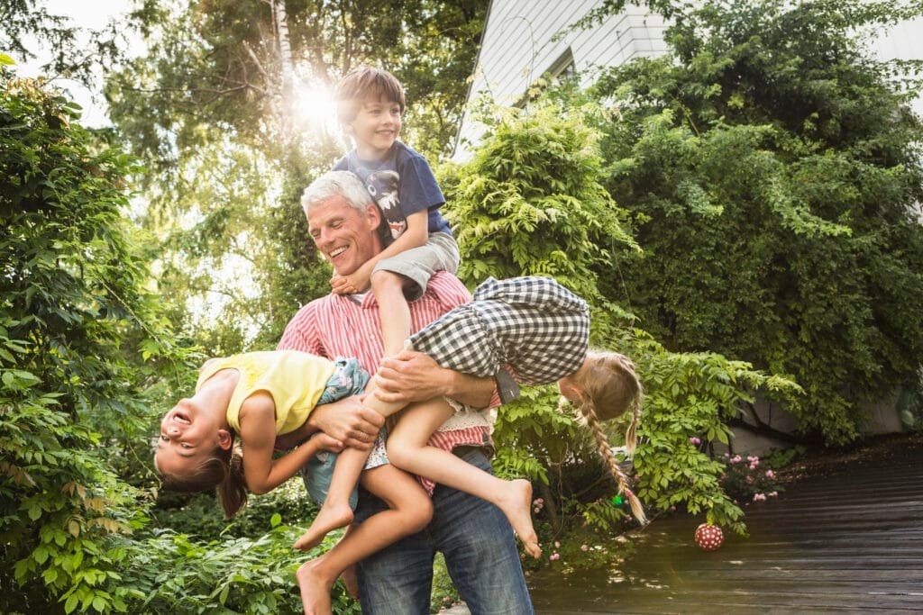How to Increase Bone Density Naturally with Vitamin D3 7 Playful outdoor family bonding activity, showcasing joyful moments of health and togetherness.