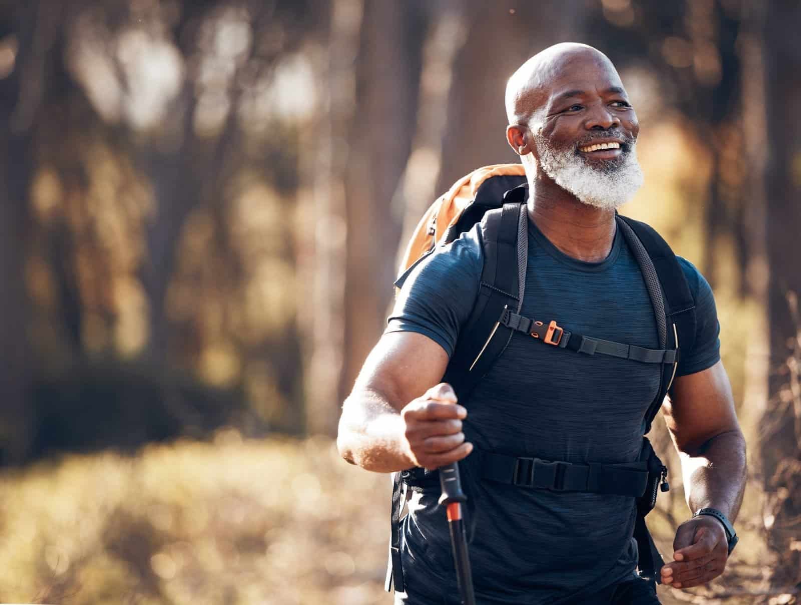 fitness hiking and smile with black man in forest 2023 11 27 05 02 11 utc scaled