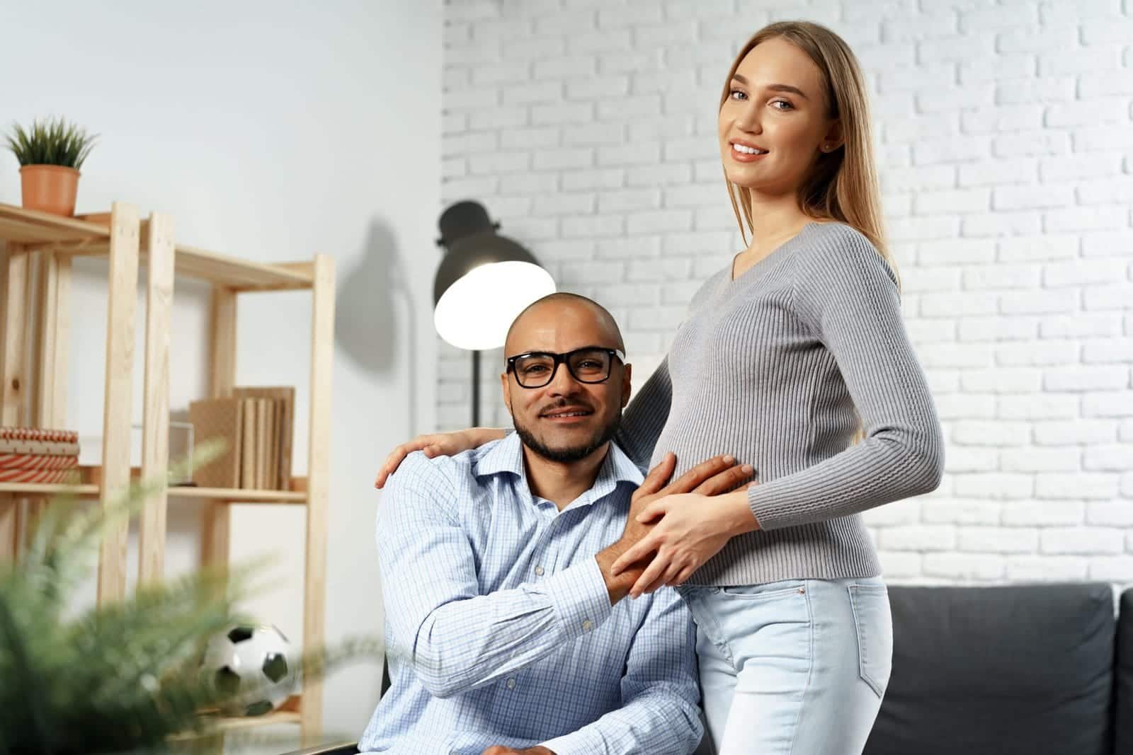 pregnant woman holding a hand of her disabled husb 2023 11 27 05 26 55 utc scaled