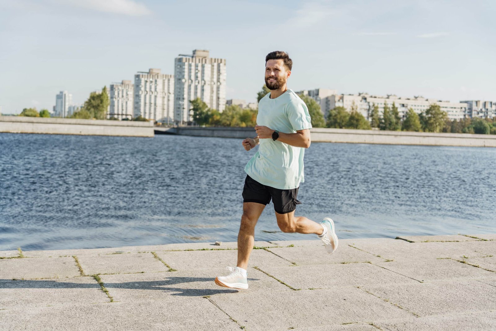 Health man running with improved cardiovascular health and lower blood pressure by supplementing with L-Theanine