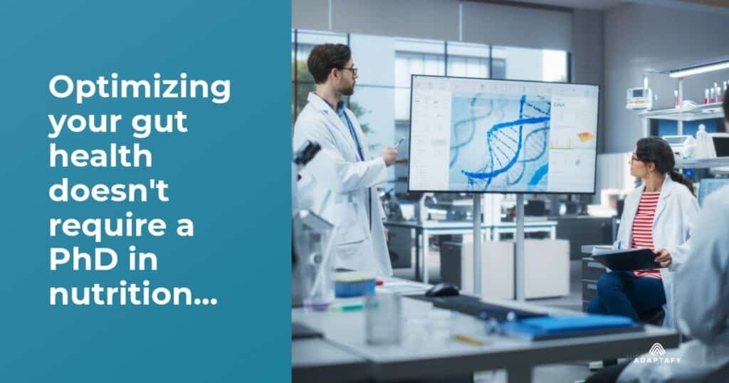 a man in a lab coat looking at a large screen. Optimizing your gut health doesn't require a PhD in nutrition or a second mortgage for supplements. Digestive Health Problems article for men by Adaptafy.