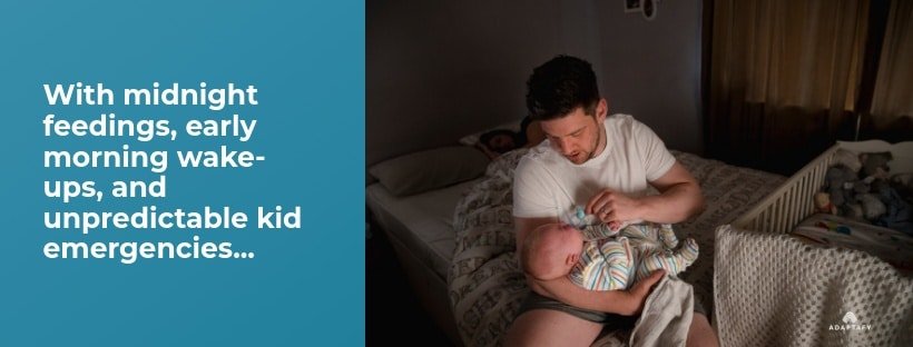 Young dad feeding baby a bottle late at night next to crib. Good Sleep Health article for dads by Adaptafy.