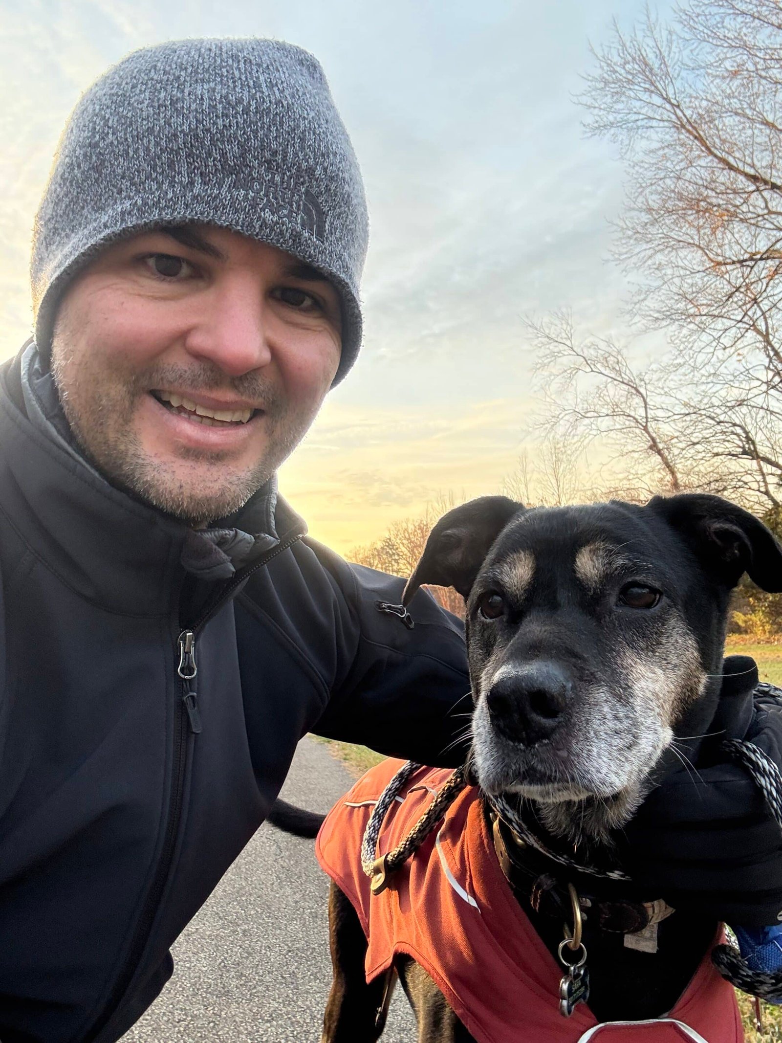 Geoffrey & Tucker_Founder of Adaptafy Selfie image of Geoffrey (Founder of Adaptafy) and his Dog (Tucker) on a brisk walk. This image support About Us - as many times Geoffrey and Tucker are in Instagram Post together.